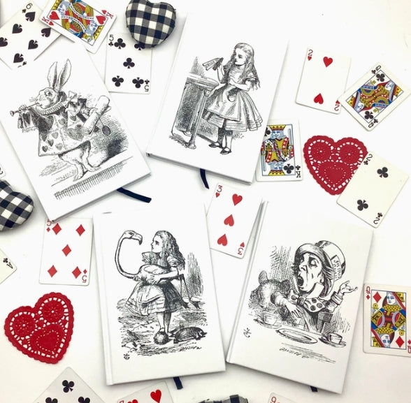 Playing cards with Alice in Wonderland illustrations on a white background