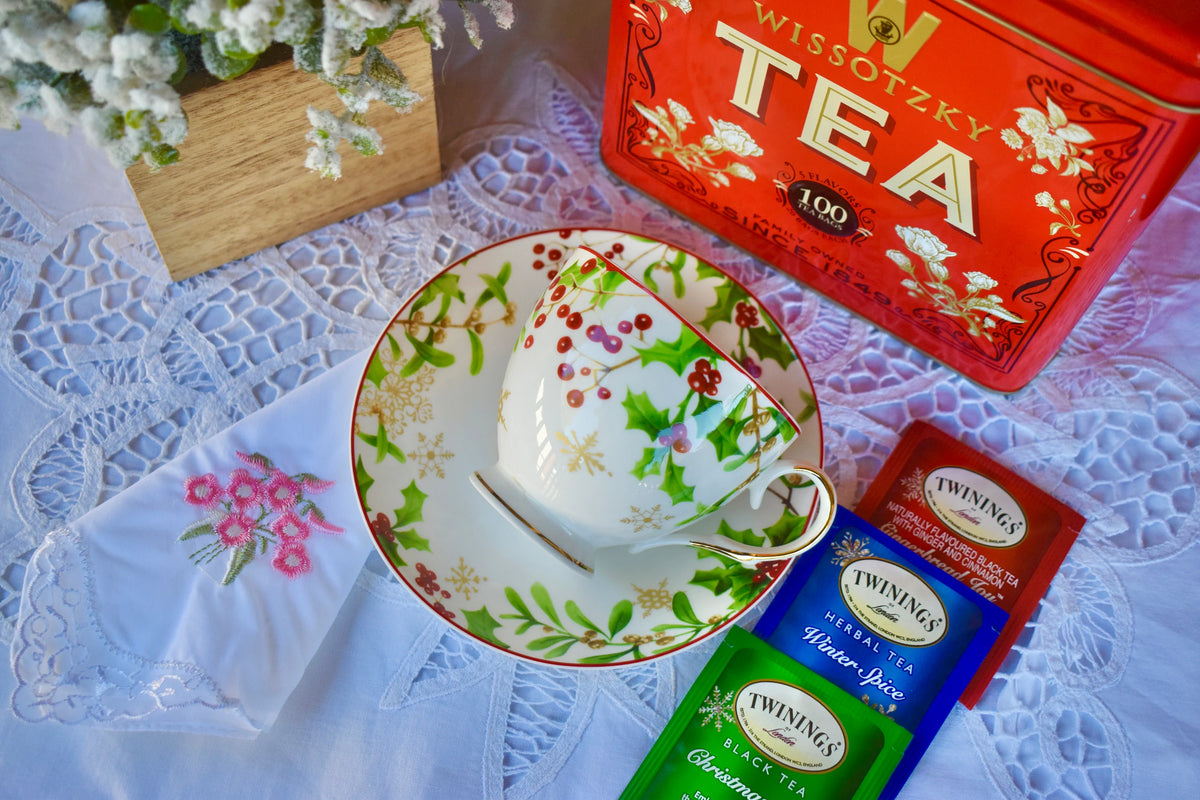 Holly Berries and Poinsettias Teacup and Saucer